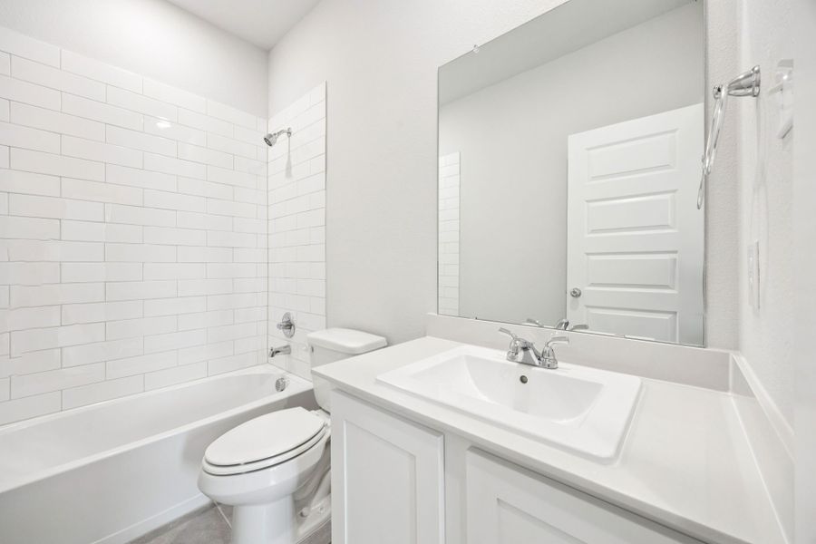 Bathroom in the Emmy II home plan by Trophy Signature Homes - REPRESENTATIVE PHOTO Bathroom in the Emmy II home plan by Trophy Signature Homes - REPRESENTATIVE PHOTO