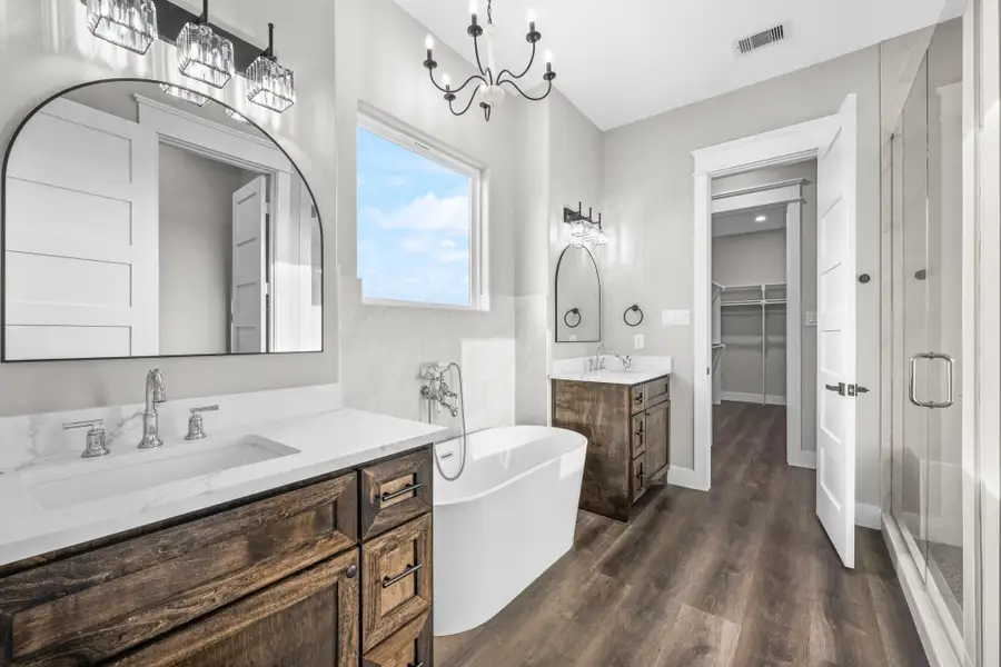 Furnished interior view inside a new home in , New Waverly (Image 5).