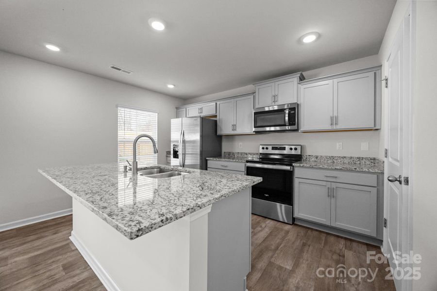 Furnished interior view inside a new home in , Mocksville (Image 19).