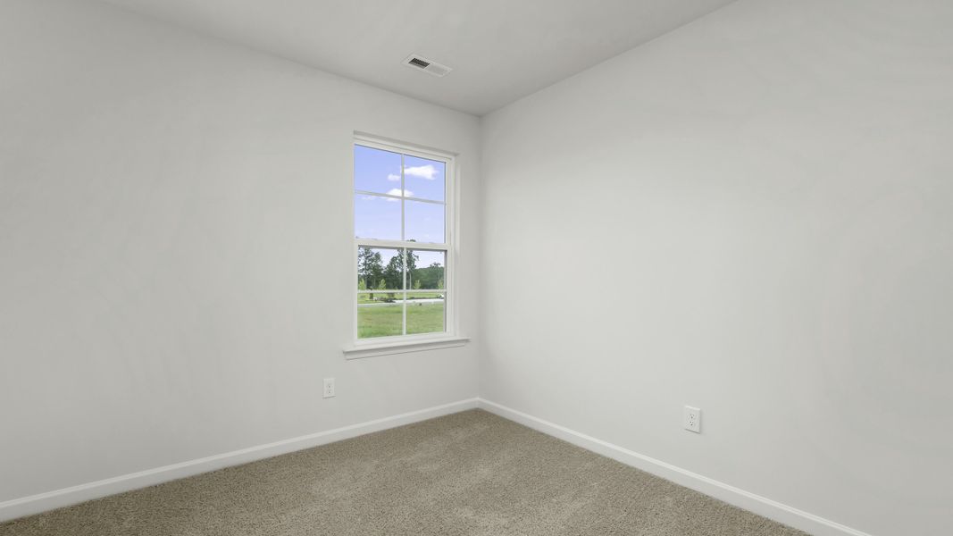 Representative unfurnished interior of a home built from the Newton by D.R. Horton in The Gables at Edinborough Townes, Gibsonville (Image 14).