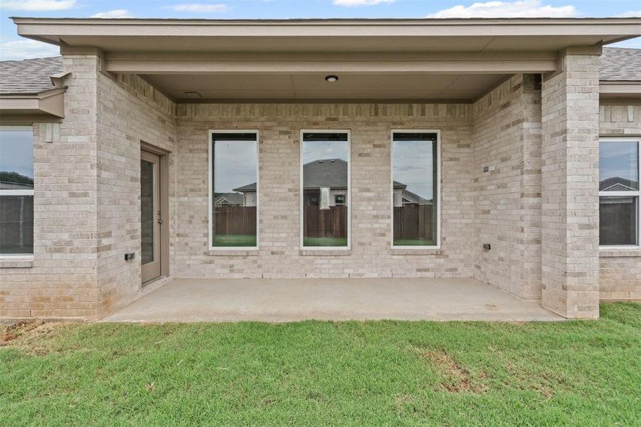 Front exterior of a new home in , Springtown, TX, highlighting curb appeal (Image 22). Front exterior of a new home in , Springtown, TX, highlighting curb appeal (Image 22).
