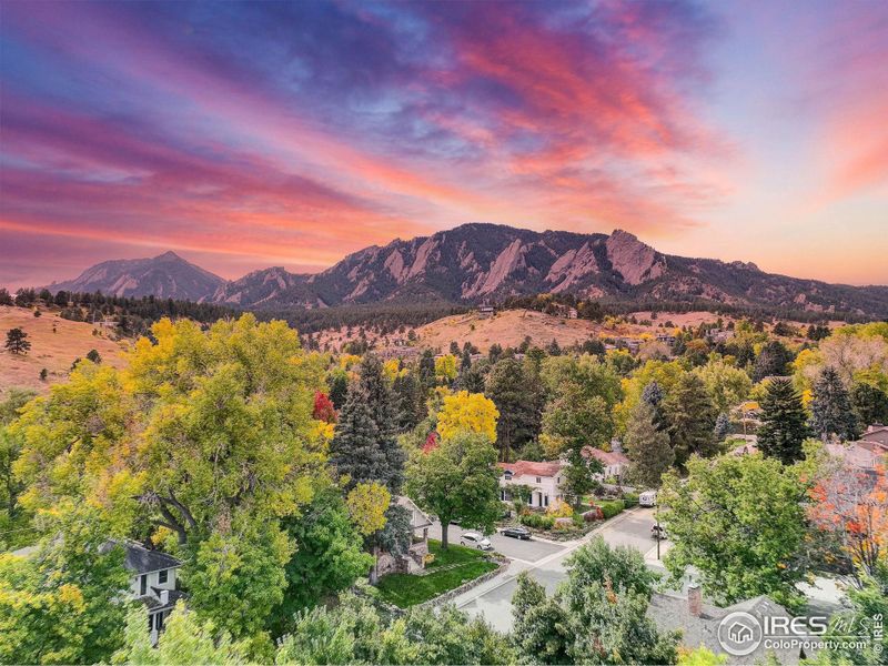 Nestled amidst charming tree-lined streets and enduring architecture, this residence is just steps away from the renowned Chautauqua Park.