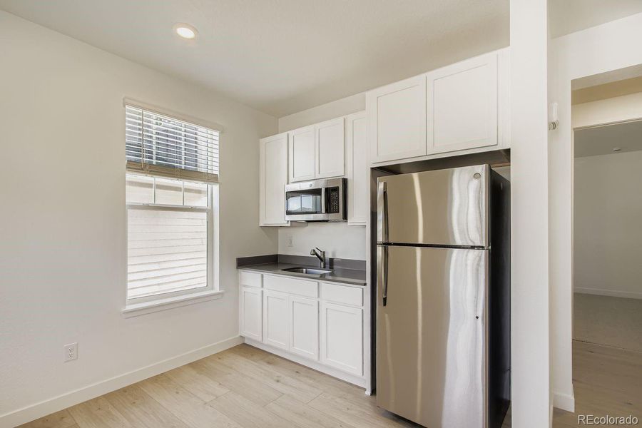 Furnished interior view inside a new home in Ken-Caryl Ranch, Littleton (Image 6).