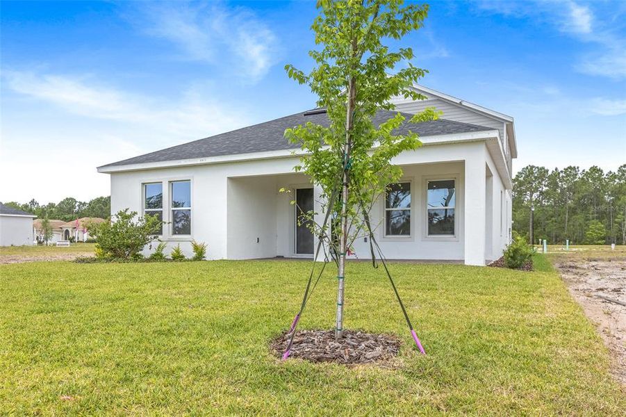 Exterior details and patio area of a home in Gray Hawk at Hole Two, Daytona Beach (Image 3). Exterior details and patio area of a home in Gray Hawk at Hole Two, Daytona Beach (Image 3).
