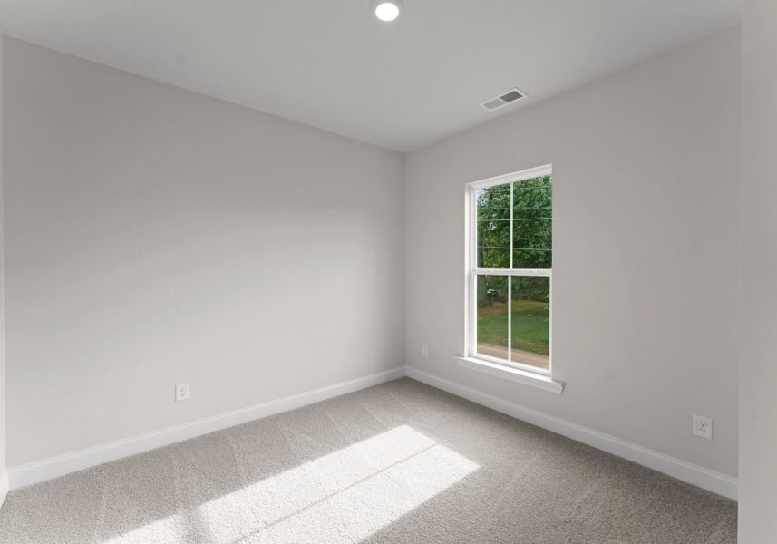 Representative unfurnished interior of a home built from the Lily by Red Cedar Homes in Cedars at First Street, Huntersville (Image 14).