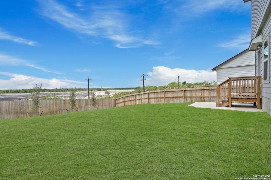 Front exterior of a new home in Cinco Lakes, San Antonio, TX, highlighting curb appeal (Image 26). Front exterior of a new home in Cinco Lakes, San Antonio, TX, highlighting curb appeal (Image 26).