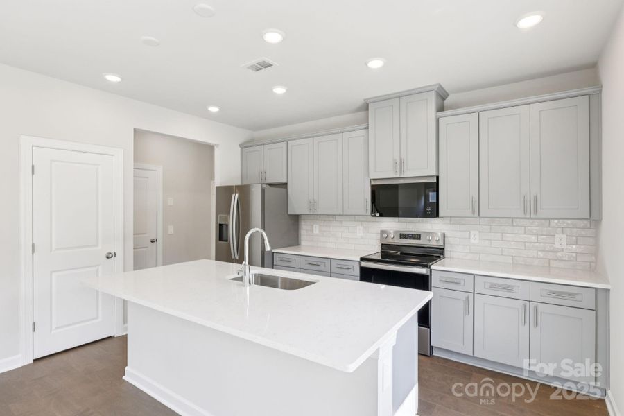 Photo is not of the actual home, but is an inspirational photo of builder’s model home and may depict options, furnishings, and/or decorator features that are not included