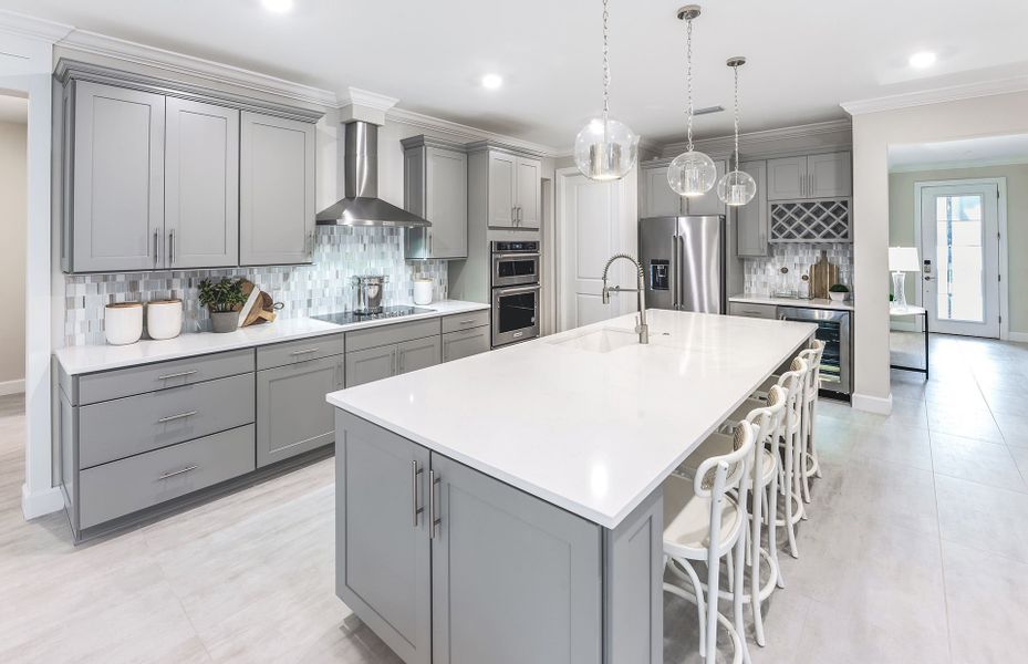 Kitchen with stainless steel appliances with large center island