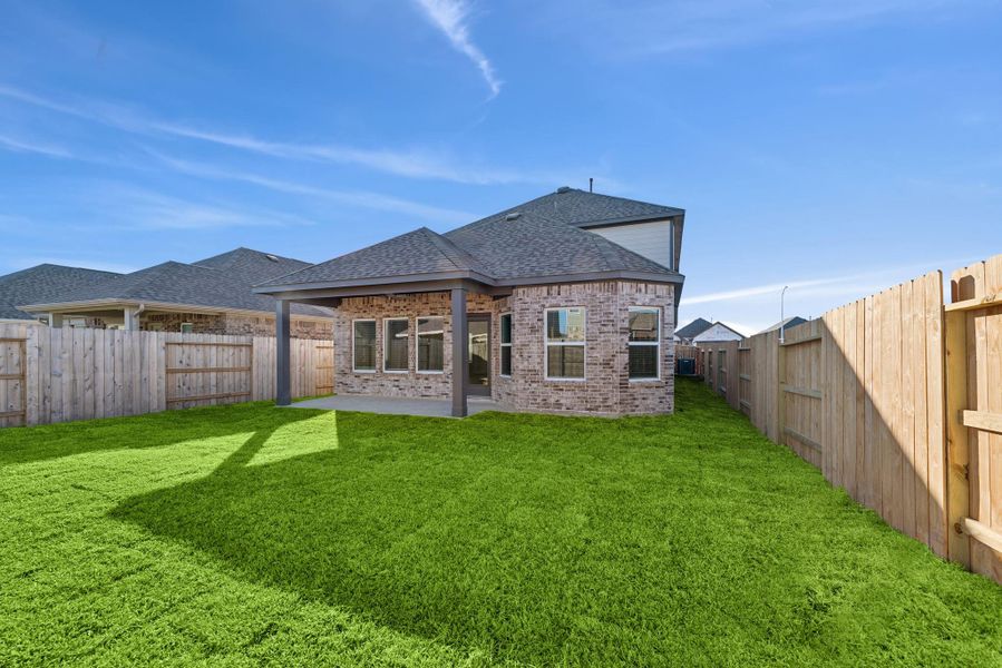 Exterior details and patio area of a home in Marvida, Cypress (Image 4).