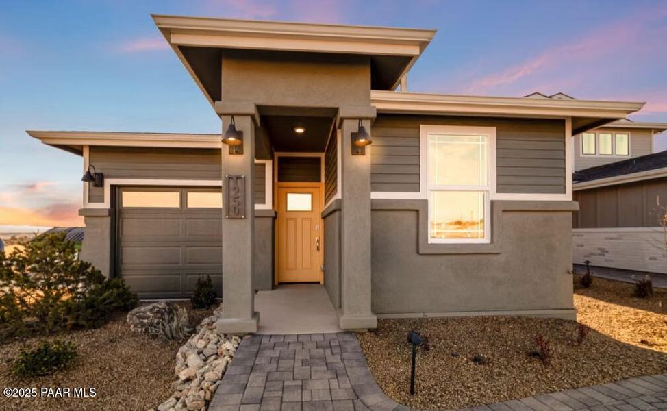 Front exterior of a new home in South Ranch Southern Collection, Prescott, AZ, highlighting curb appeal (Image 1). Front exterior of a new home in South Ranch Southern Collection, Prescott, AZ, highlighting curb appeal (Image 1).