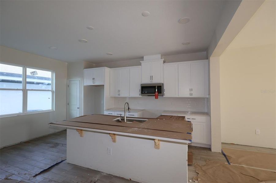 In-progress construction of a new home in Center Lake on the Park, St. Cloud, FL (Image 8).