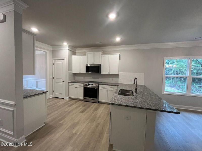 Furnished interior view inside a new home in Palmetto Creek, Bolivia (Image 8).