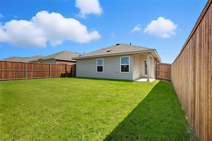 Back of house featuring a patio and a fenced backyard Back of house featuring a patio and a fenced backyard