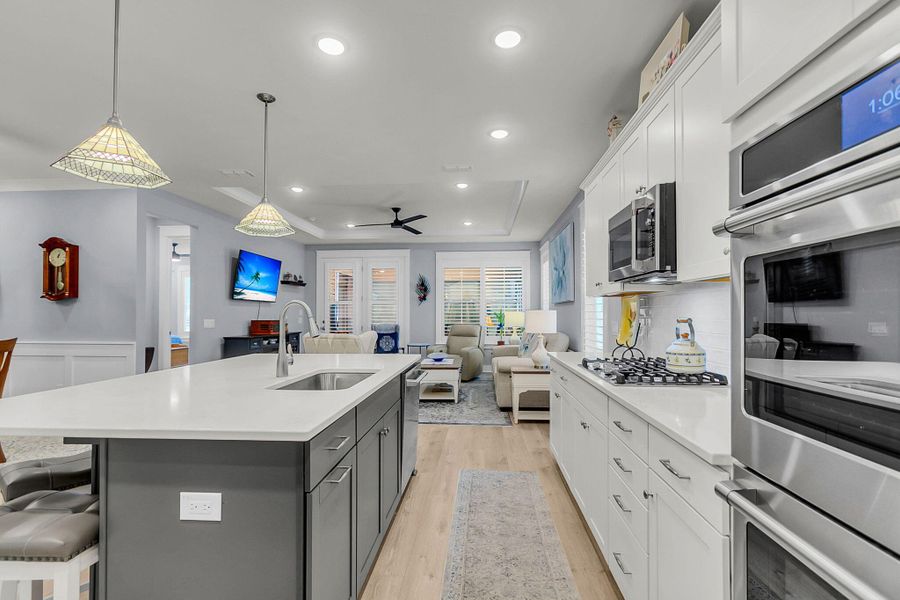 Furnished interior view inside a new home in K. Hovnanian's® Four Seasons at Lakes of Cane Bay, Summerville (Image 13).