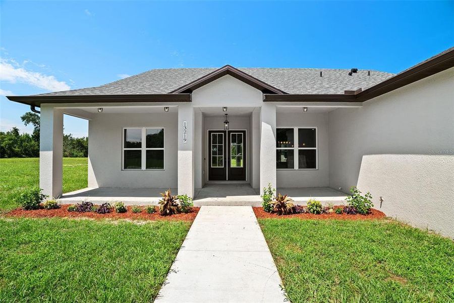 Front exterior of a new home in , San Antonio, FL, highlighting curb appeal (Image 30).