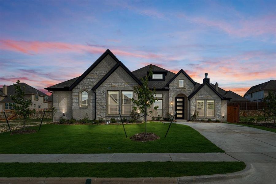 Front exterior of a new home in Villages of Walnut Grove, Midlothian, TX, highlighting curb appeal (Image 1). Front exterior of a new home in Villages of Walnut Grove, Midlothian, TX, highlighting curb appeal (Image 1).