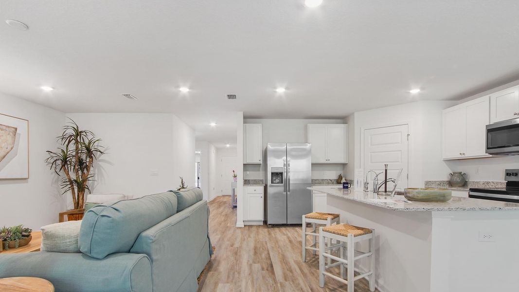 Furnished interior view inside a new home in Ashton Park Phase III, Freeport (Image 5).