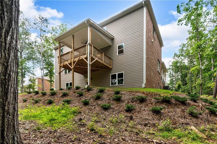 Exterior details and patio area of a home in The Estates at Hurricane Pointe, Douglasville (Image 3). Exterior details and patio area of a home in The Estates at Hurricane Pointe, Douglasville (Image 3).