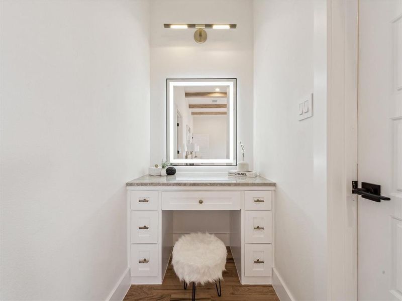 Bathroom featuring vanity and hardwood / wood-style flooring