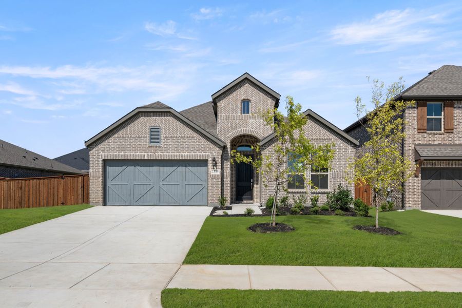 Front exterior of a home in the LaPrelle community, located in Haslet, TX (Image 15).