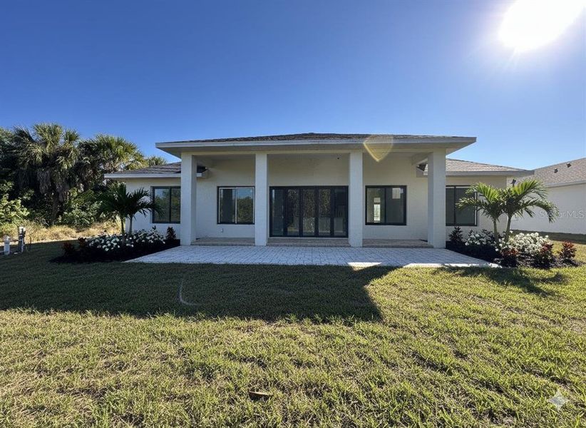 Exterior details and patio area of a home in , Port Charlotte (Image 2). Exterior details and patio area of a home in , Port Charlotte (Image 2).