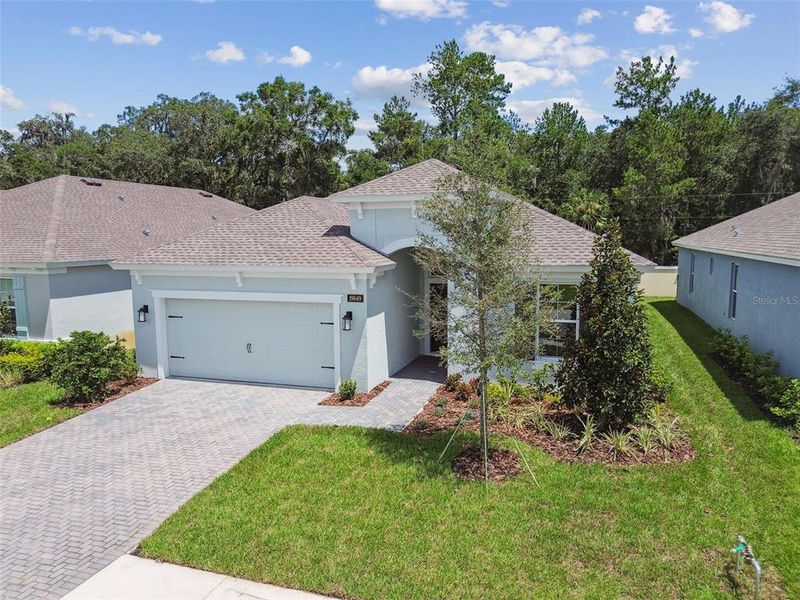Front exterior of a new home in Cascades at Southern Hills, Brooksville, FL, highlighting curb appeal (Image 26).