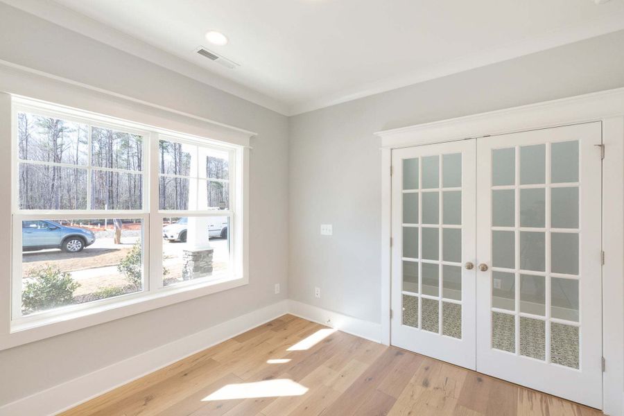 Representative unfurnished interior of a home built from the Austin by Caviness & Cates Communities in Bartlett Manor, Youngsville (Image 89).