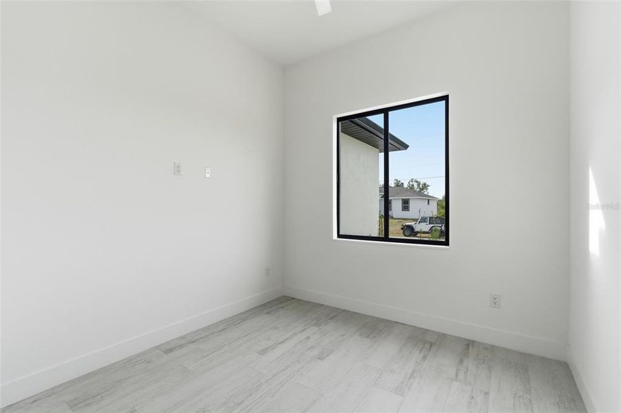Spacious, unfurnished interior of a new home in , Port Charlotte (Image 38).