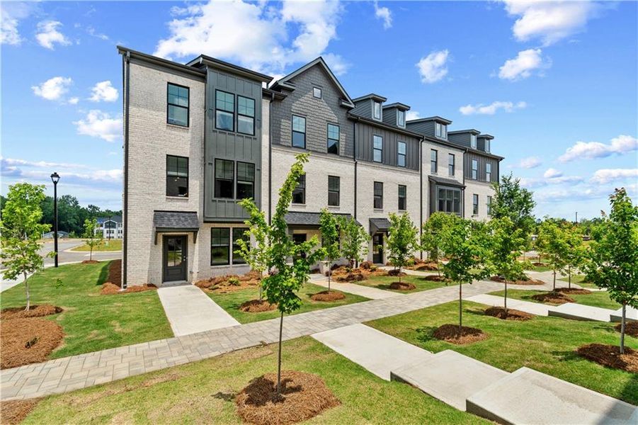 Front exterior of a new home in Silverock, McDonough, GA, highlighting curb appeal (Image 19).