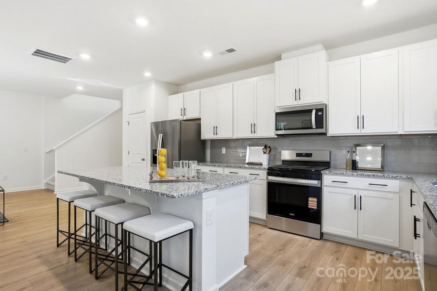 Furnished interior view inside a new home in Bellina, York (Image 27).