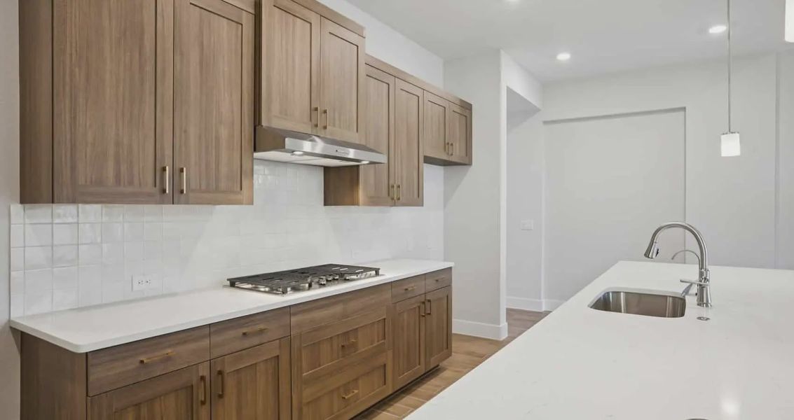 Furnished interior view inside a new home in 6 Creeks, Kyle (Image 6).