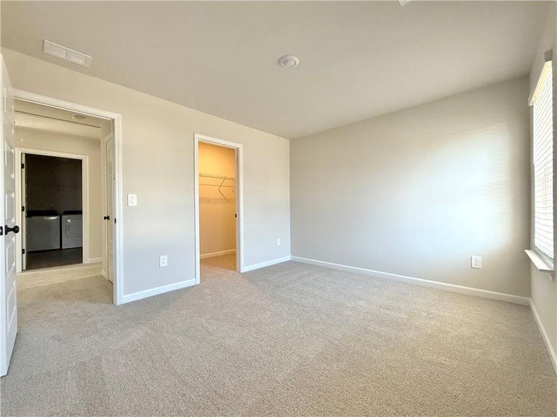 Spacious, unfurnished interior of a new home in Vines at Mill Creek - Estate Series, Braselton (Image 22).