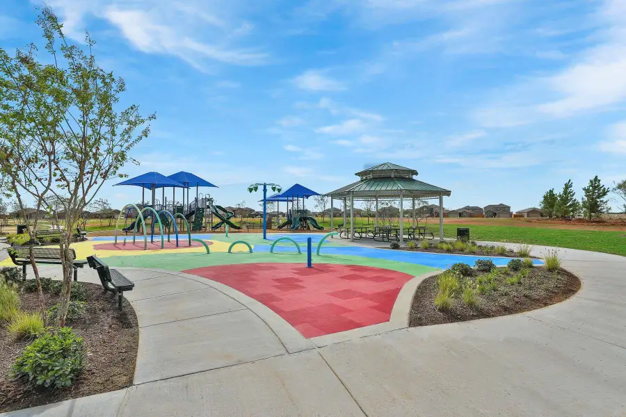 Front exterior of a new home in Freeman Ranch, Katy, TX, highlighting curb appeal (Image 13).