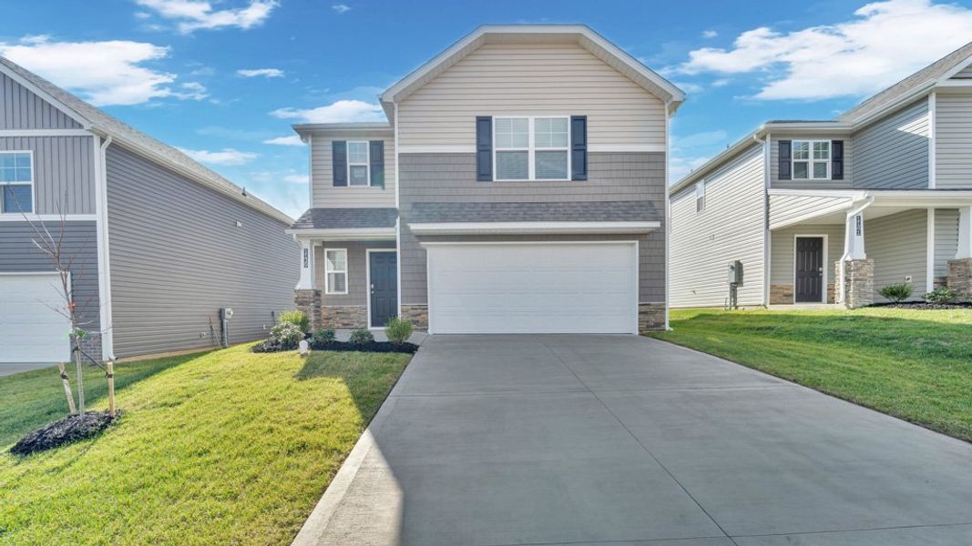 Front exterior of a new home in Johnson Farms, Greeneville, TN, highlighting curb appeal (Image 1). Front exterior of a new home in Johnson Farms, Greeneville, TN, highlighting curb appeal (Image 1).