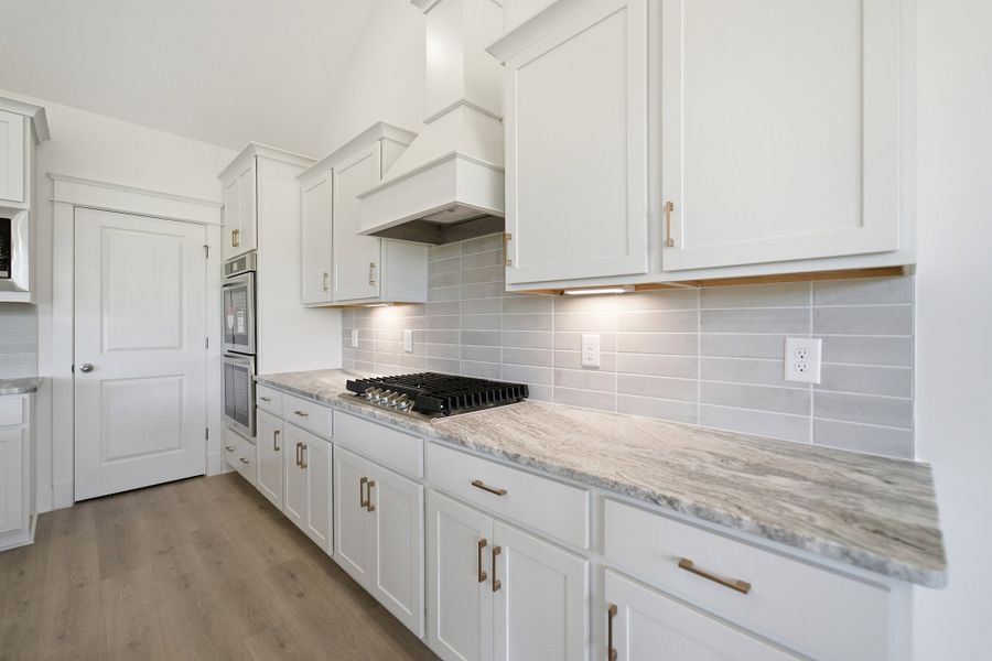 Furnished interior view inside a new home in Aden Woods, Fairview (Image 12).