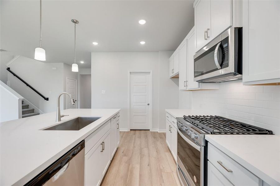 Furnished interior view inside a new home in Spiritas Ranch, Little Elm (Image 10). Furnished interior view inside a new home in Spiritas Ranch, Little Elm (Image 10).