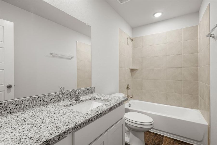 Furnished interior view inside a new home in Retreat at Fossil Creek, Fort Worth (Image 3).