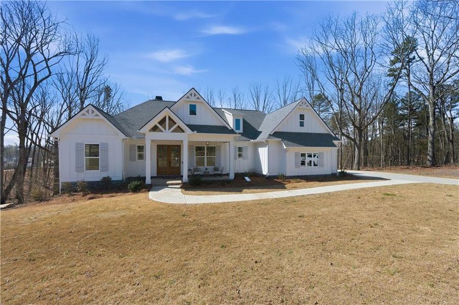 Front exterior of a new home in , Ball Ground, GA, highlighting curb appeal (Image 20).