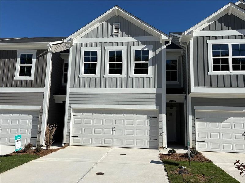 Front exterior of a new home in Longview Run, Decatur, GA, highlighting curb appeal (Image 1). Front exterior of a new home in Longview Run, Decatur, GA, highlighting curb appeal (Image 1).