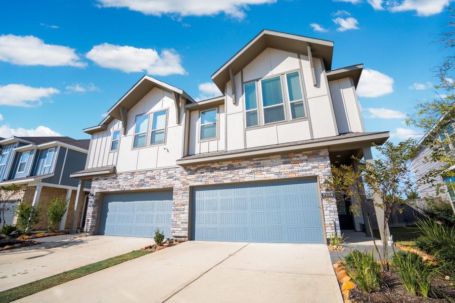 Front exterior of a new home in , Cypress, TX, highlighting curb appeal (Image 2). Front exterior of a new home in , Cypress, TX, highlighting curb appeal (Image 2).