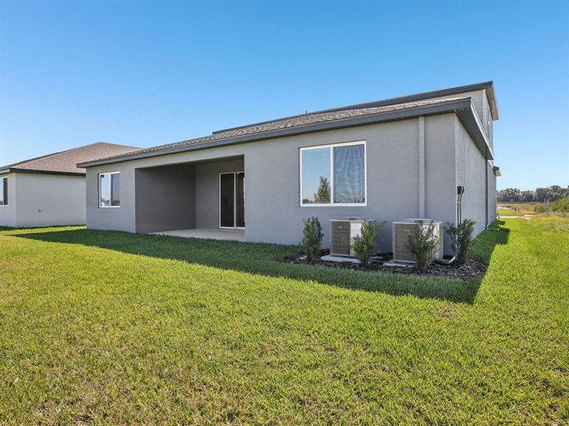Exterior details and patio area of a home in Two Rivers - Signature Series, Zephyrhills (Image 3).