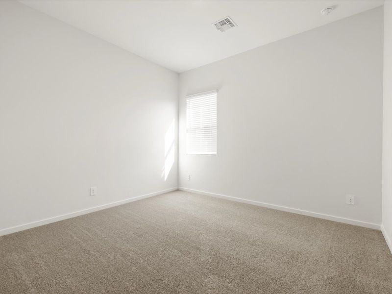 Spacious, unfurnished interior of a new home in White Tank Foothills Signature Series, Waddell (Image 13).