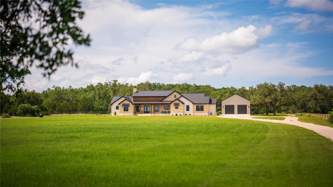 Front exterior of a new home in , San Marcos, TX, highlighting curb appeal (Image 17).