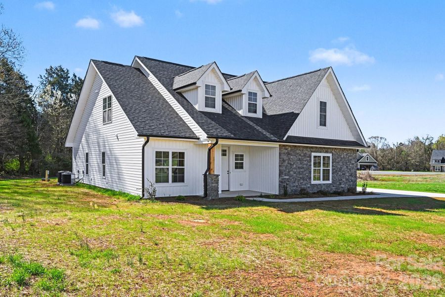 Exterior details and patio area of a home in , Salisbury (Image 26).
