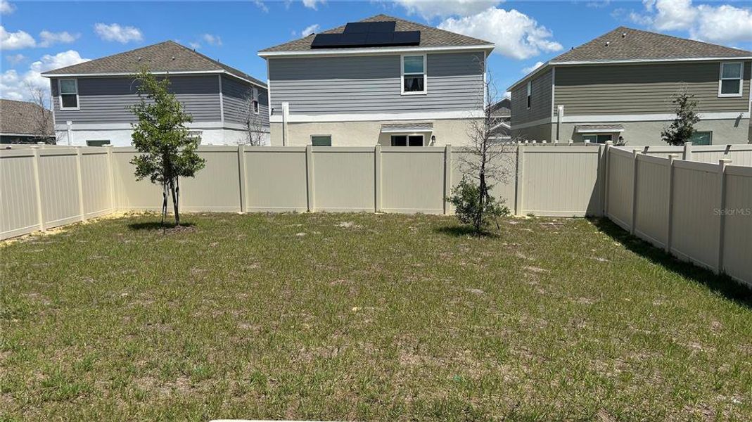 Exterior details and patio area of a home in Lawson Dunes, Haines City (Image 19).