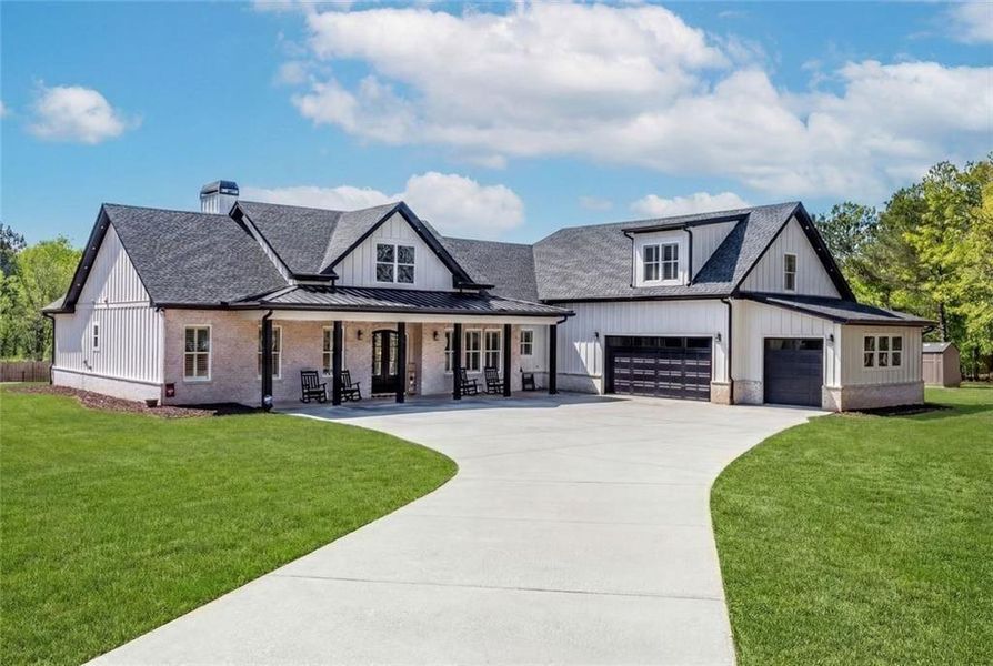 Front exterior of a new home in , Bethlehem, GA, highlighting curb appeal (Image 21).