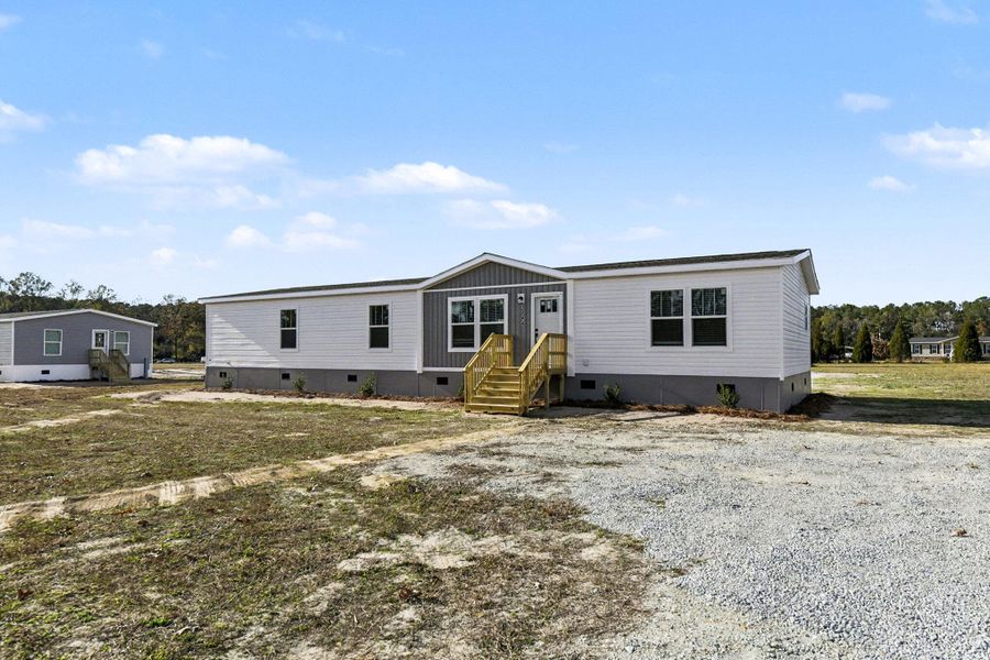 Exterior details and patio area of a home in , Ridgeville (Image 13). Exterior details and patio area of a home in , Ridgeville (Image 13).