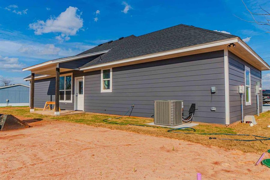Exterior details and patio area of a home in , Granbury (Image 24). Exterior details and patio area of a home in , Granbury (Image 24).