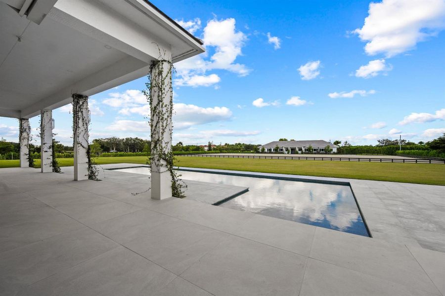 Exterior details and patio area of a home in , Wellington (Image 41). Exterior details and patio area of a home in , Wellington (Image 41).