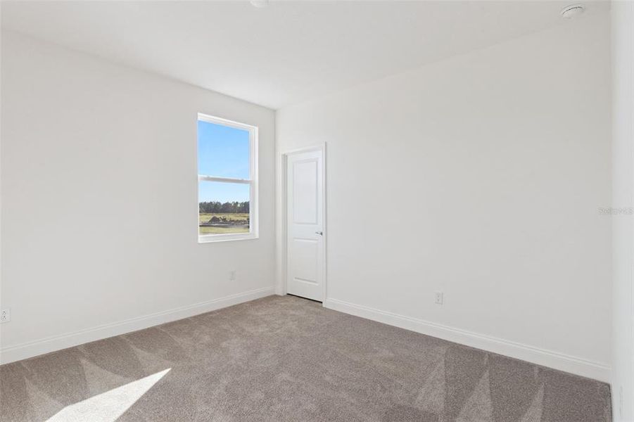 Spacious, unfurnished interior of a new home in Tamarack at Two Rivers, Zephyrhills (Image 43).